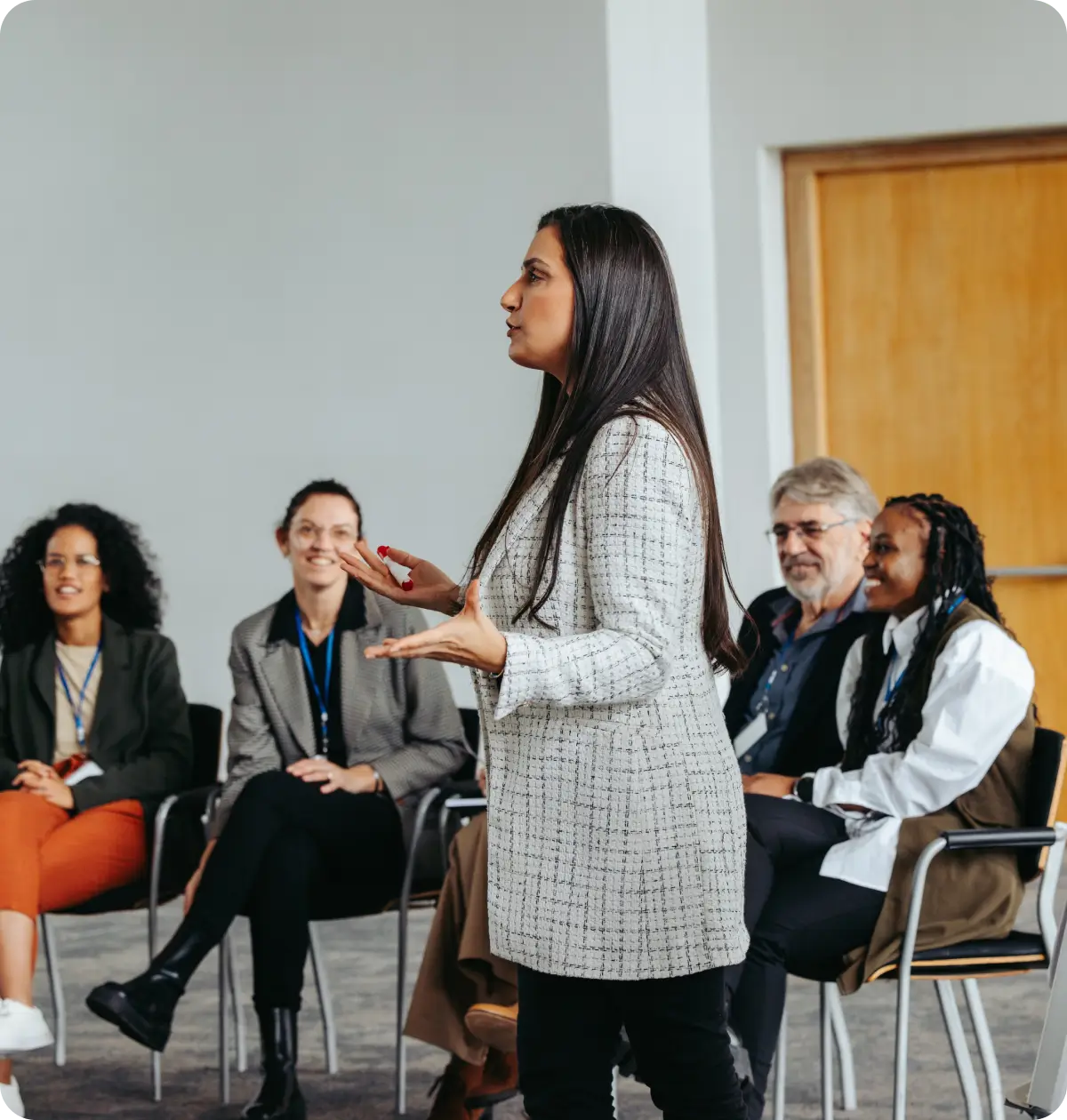 Woman leading diverse group discussion